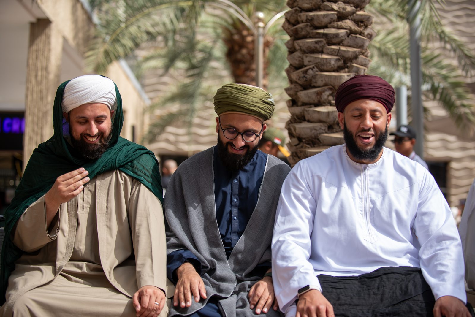 Three scholars sharing a moment together