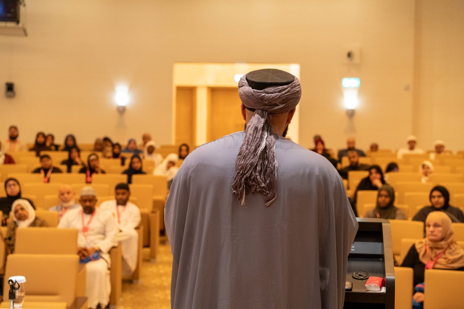A scholar leading a teaching session